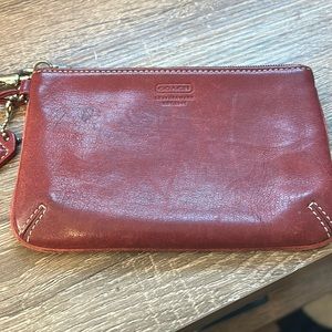 Well loved Coach wristlet